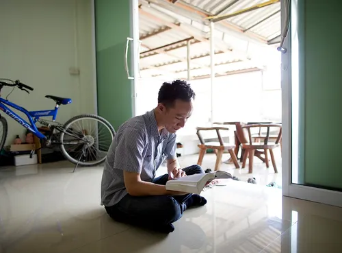 man studying scriptures