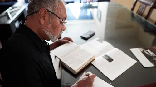 man reading scriptures