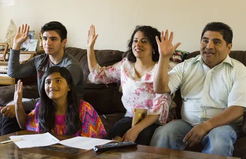 family watching conference and sustaining leaders