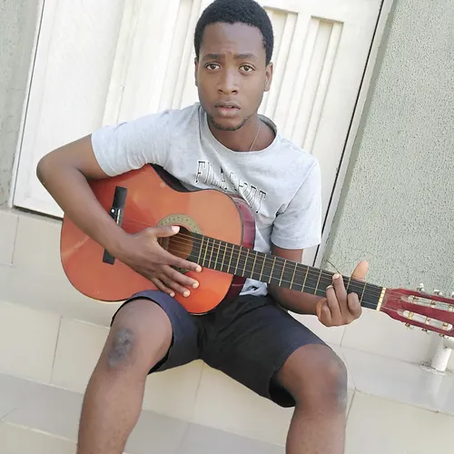 young man playing guitar