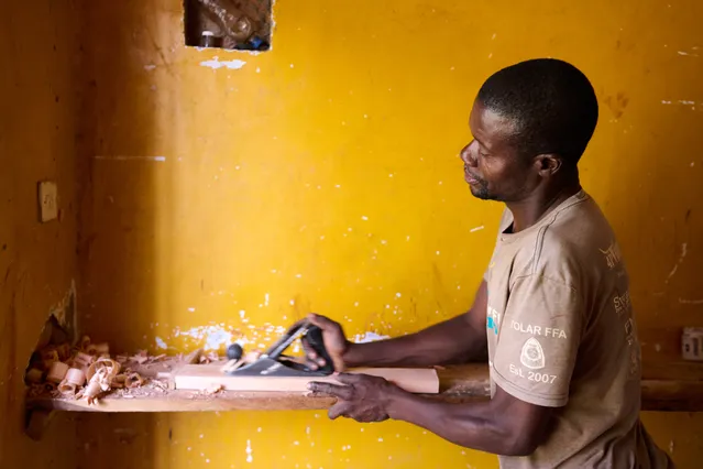 Africa Kenya FHD Stock: Man Woodworking