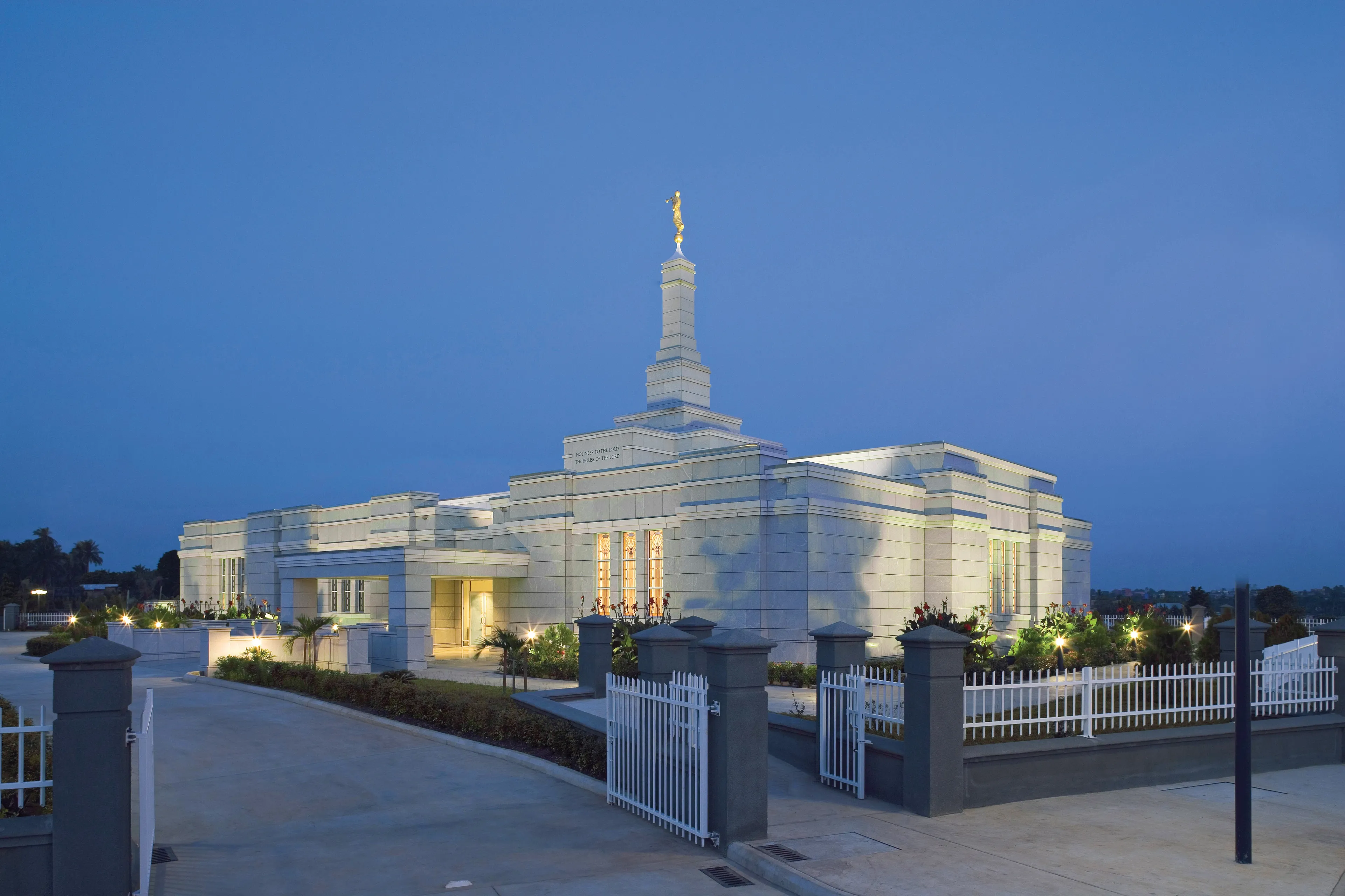 The Aba Nigeria Temple lights up in the evening.