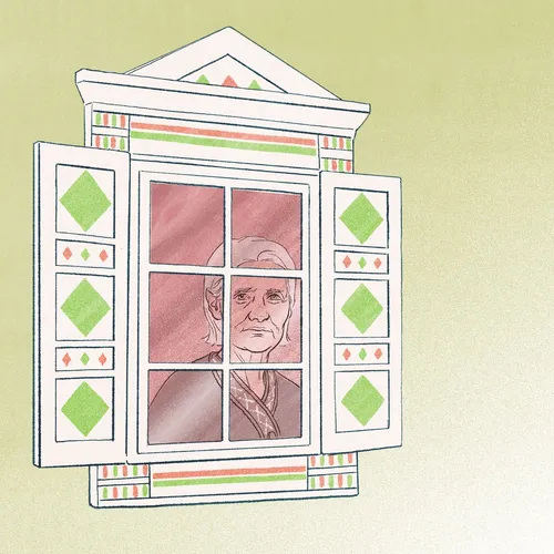 woman looking out a window