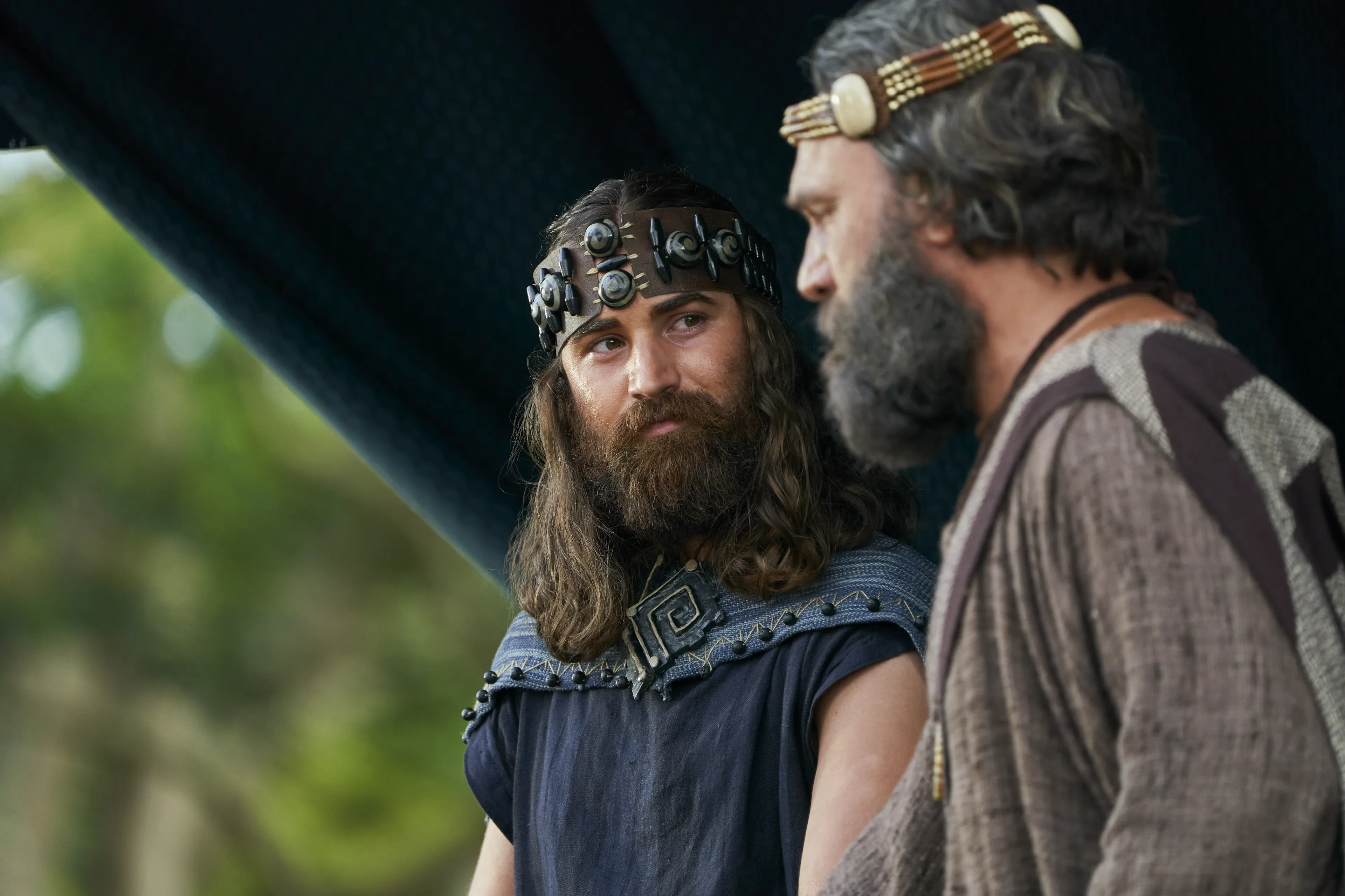 King Benjamin and Mosiah stand together on a tower talking. They are preparing to speak to the Nephites in the Land of Zarahemla.