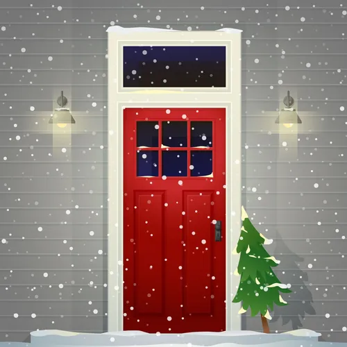 Christmas tree leaning against a red door