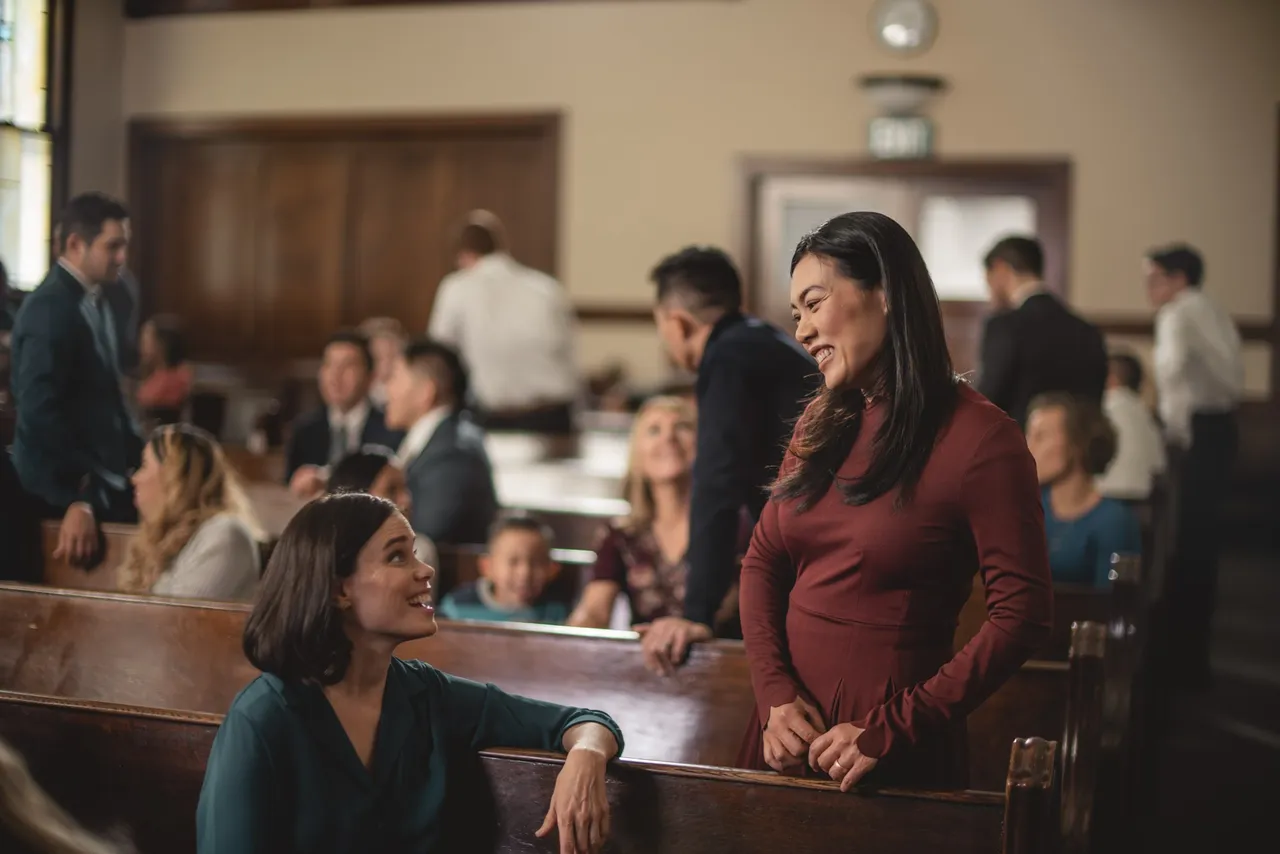 People talking at church