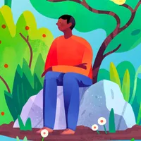 A man sits on a stone contemplating the blessings of Jesus Christ