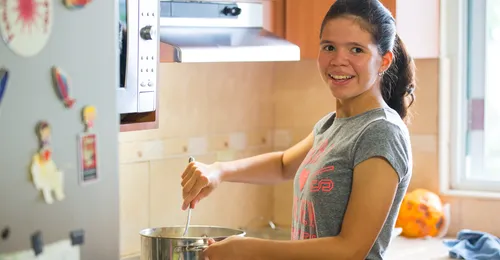 young woman cooking