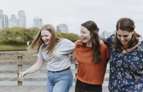 group of girls with cityscape