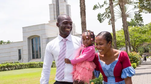 family in front of temple