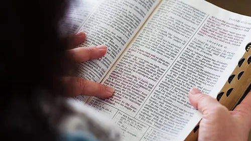 woman reading scriptures