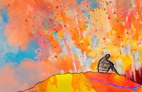 a figure sitting on a hill