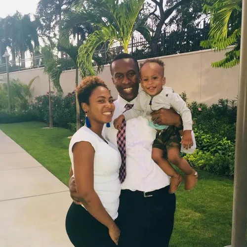 mother and father with little boy