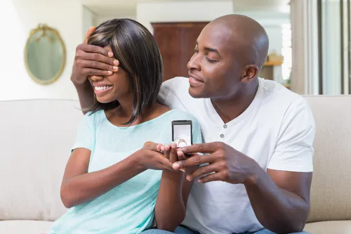 Couple with engagement ring