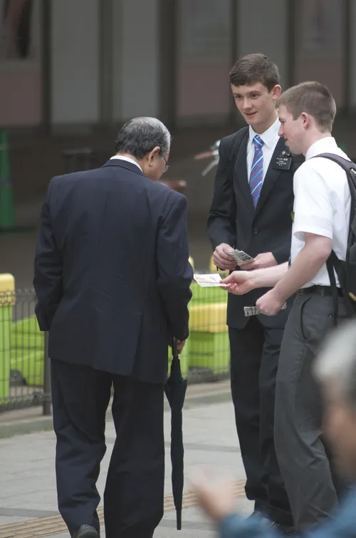 young missonary elders with man