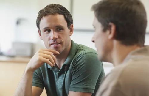 Two men talking