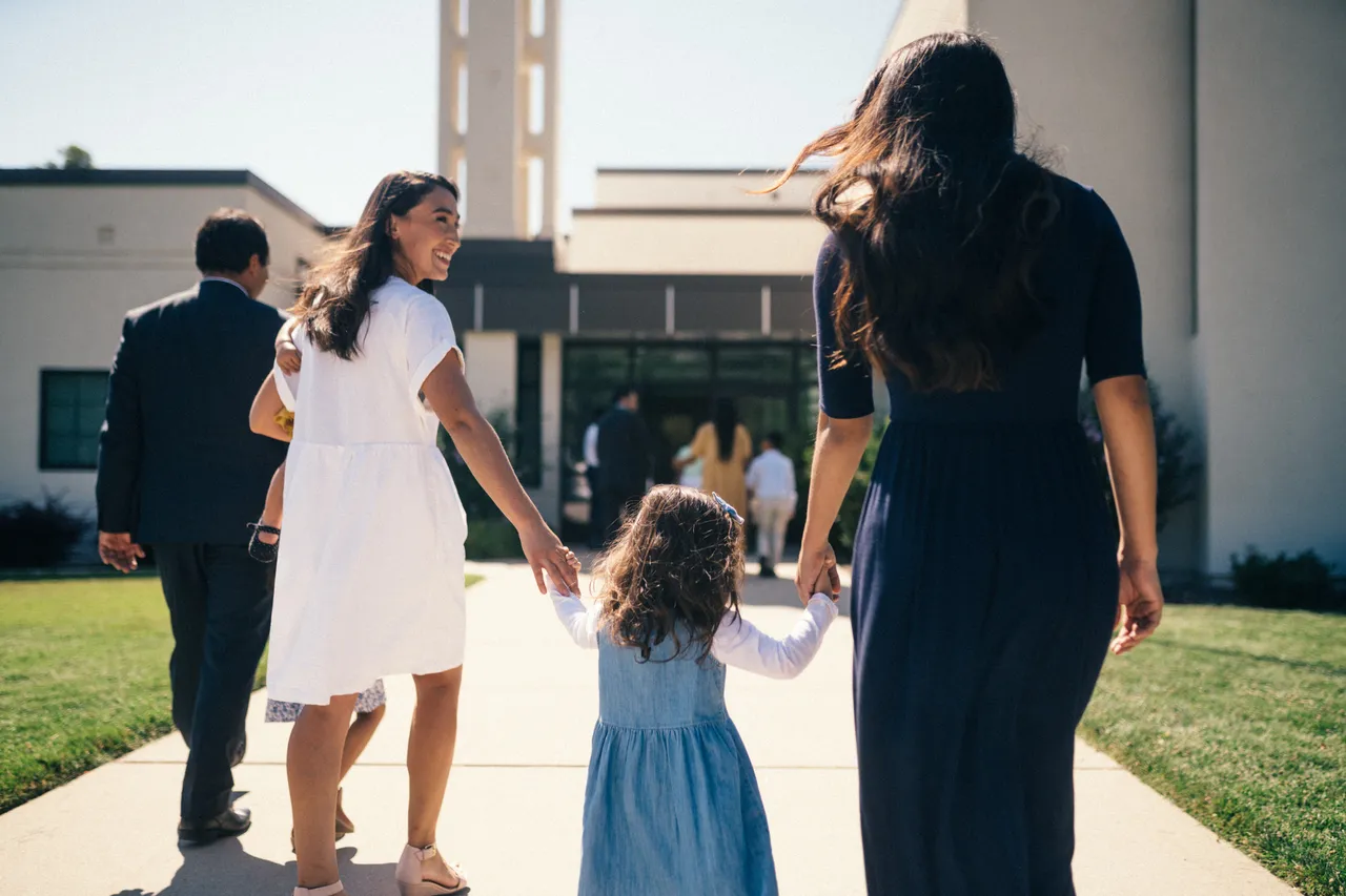 A family enters a church building