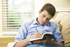 young man marking scriptures
