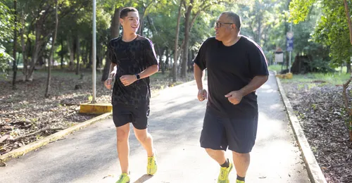 young man and father running