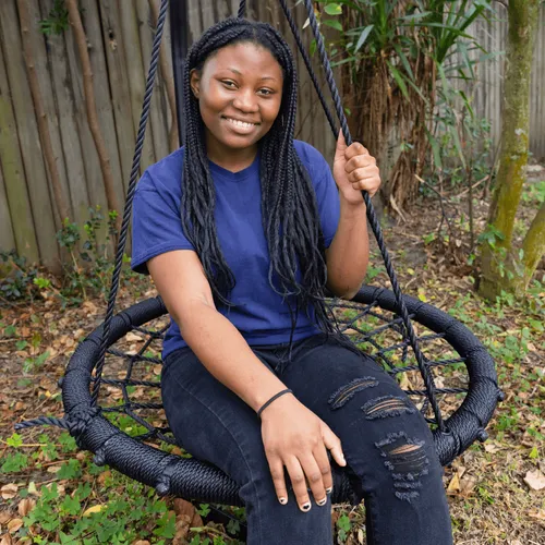 young woman on a swing