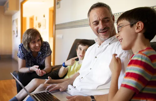 family sitting at home together
