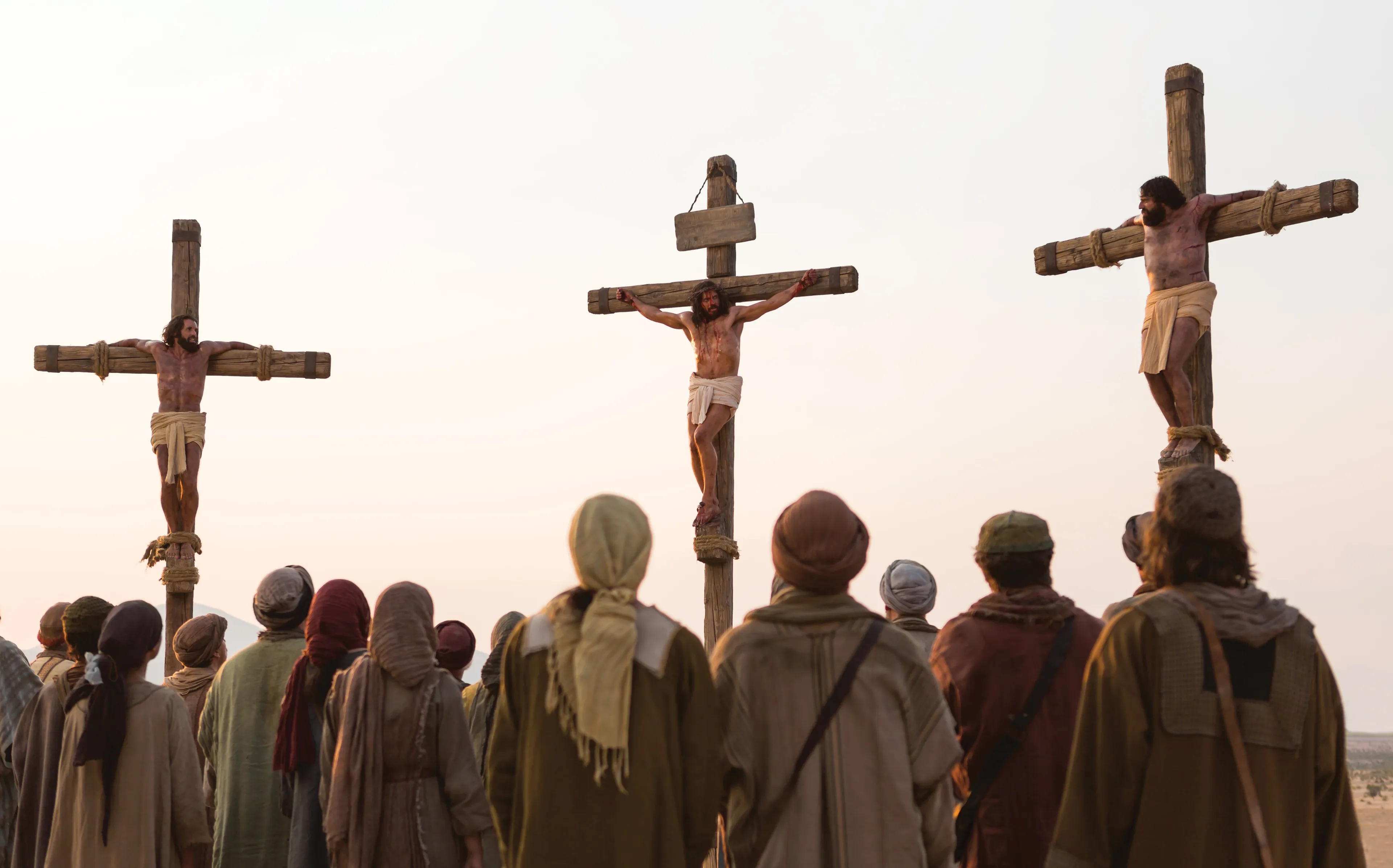 Jesus on the cross between two criminals.