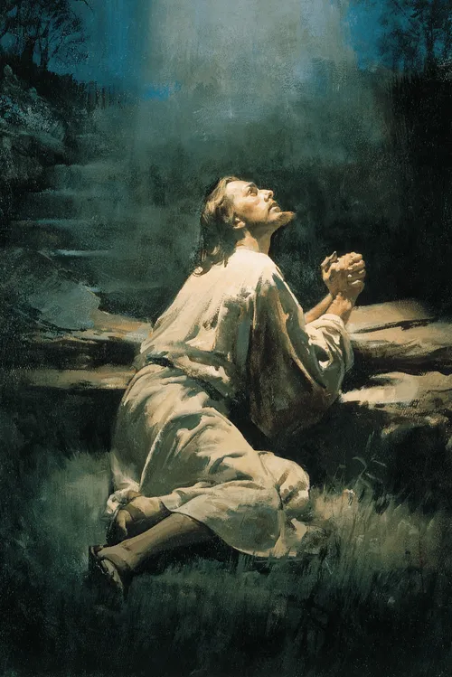Jesus Christ depicted leaning on a rock in the Garden of Gethsemane. The image depicts the Atonement of Christ.