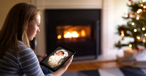 young woman with image of baby Jesus