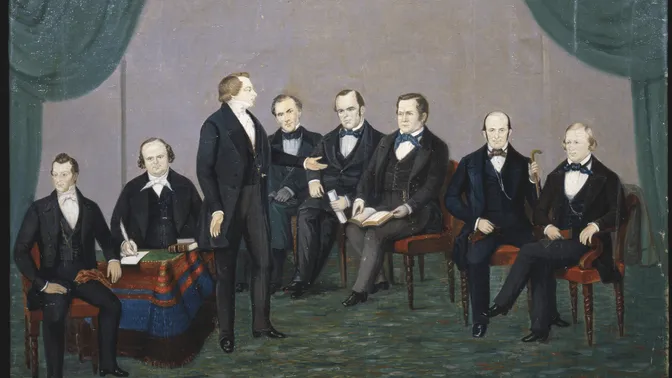 One oil on canvas painting.  Depicted in primitive style; Joseph Smith stands surrounded by seated figures of Hyrum Smith, Willard Richards, Orson Pratt, Parley P. Pratt, Orson Hyde, Heber C. Kimball and Brigham Young. Painted by William Major in Nauvoo.  Unsigned/undated.