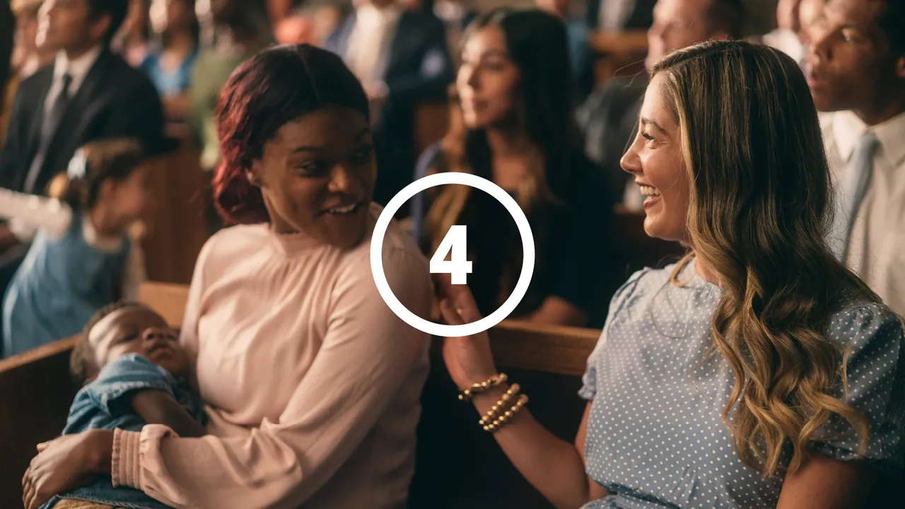 Two women greet each other at church