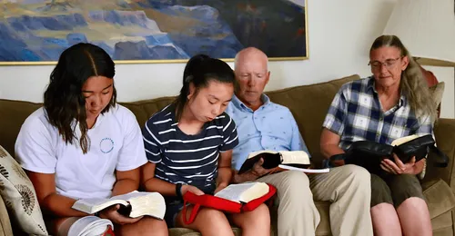 family reading scriptures