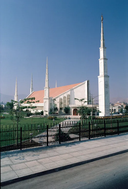 A view of the Lima Peru Temple from across the street on a clear blue day.