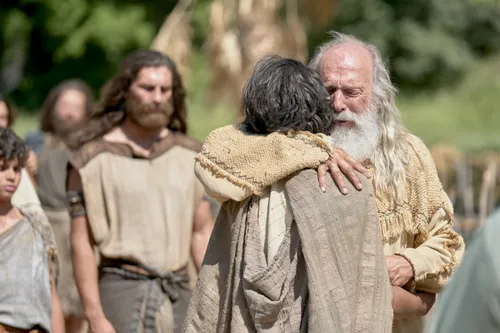 Lehi embraces Jacob after teaching him.