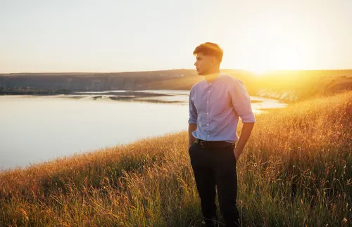 young man in field