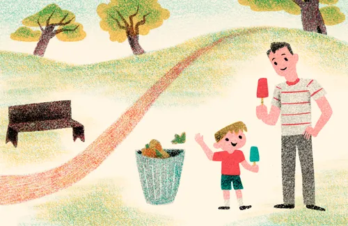 boy and dad smiling at each other