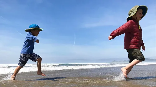 children playing on the beach