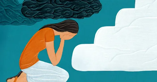 young woman kneeling under dark cloud