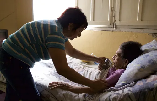 Blanca caring for her mother
