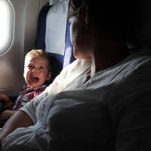 child crying on an airplane
