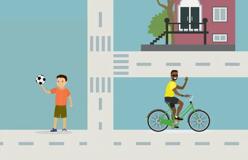 boy with soccer ball and man riding bike