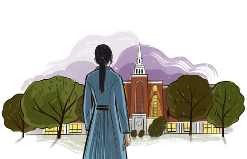 woman standing in front of church