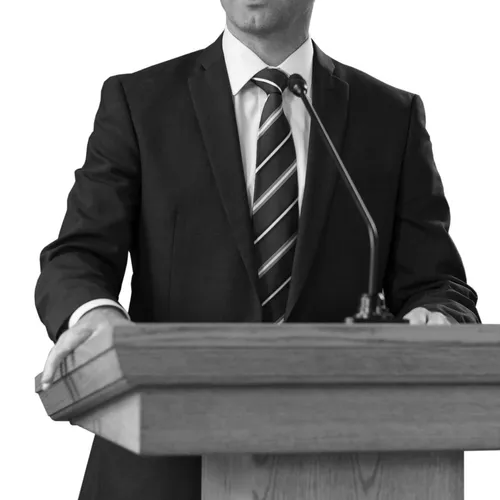man standing at pulpit