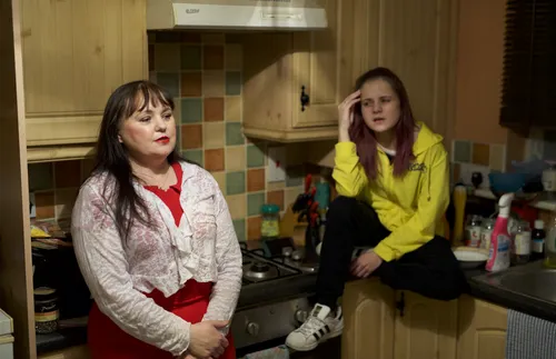 Debbie with daughter in their kitchen