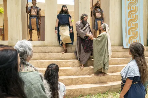 King Benjamin greets the Nephites on the steps of the temple in the Land of Zarahemla.