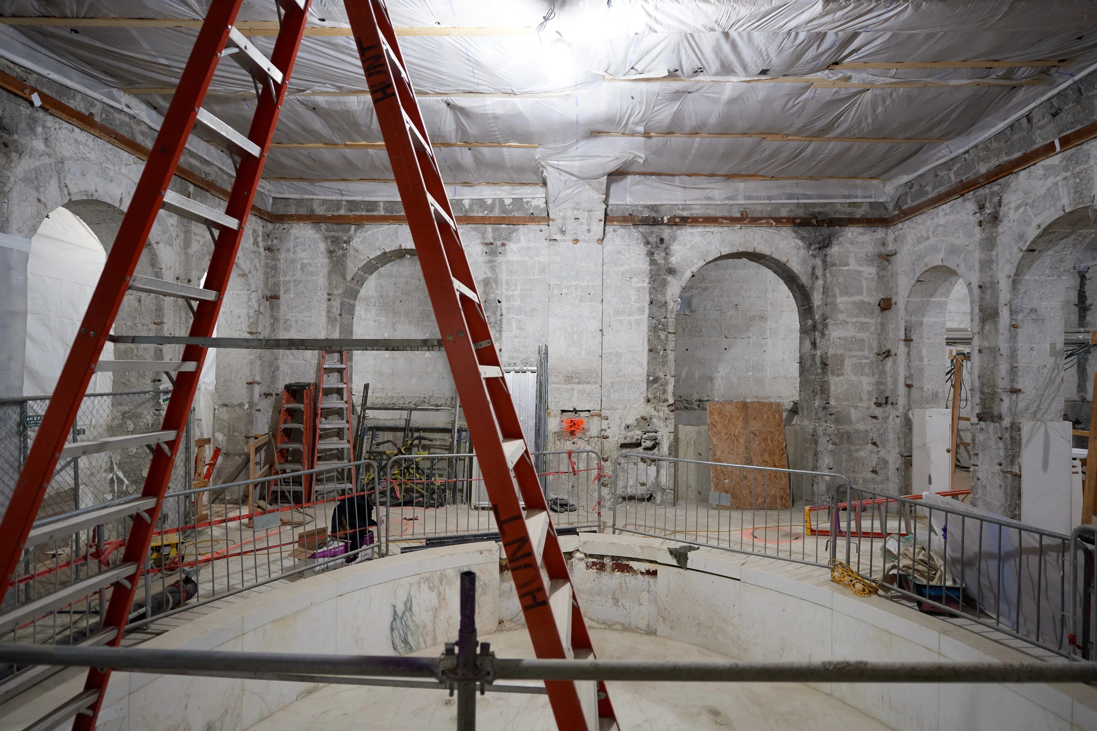 Construction on the Salt Lake Temple during September, 2020. Construction workers are working inside the temple. 