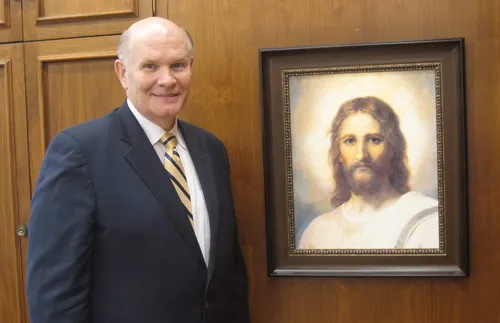 elder-renlund-with-painting-of-Christ