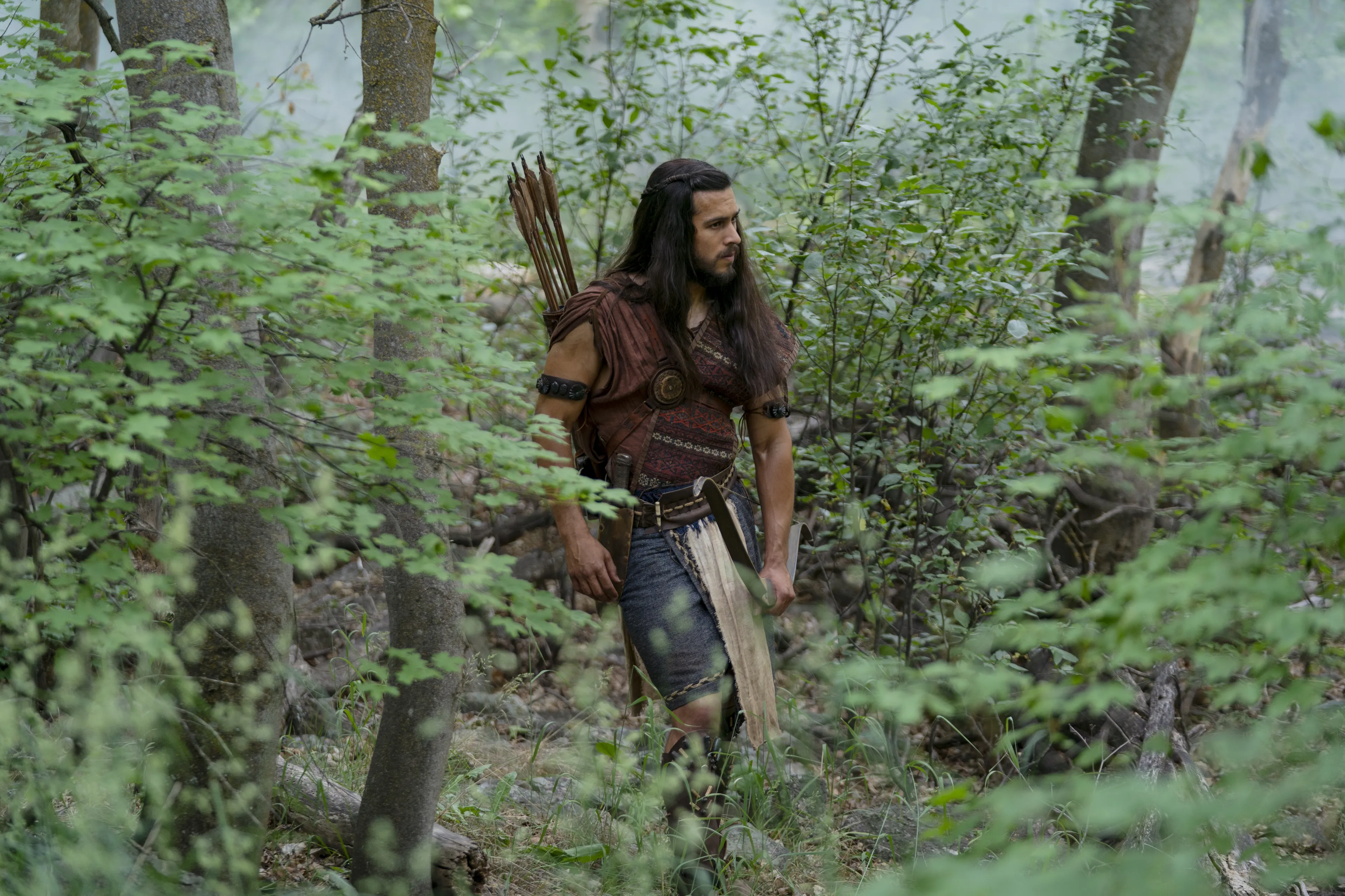 Enos hunts in the forest.