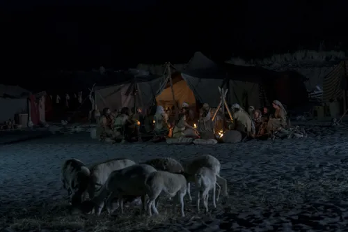 people around campfire