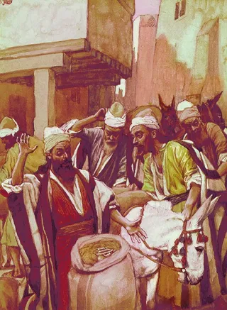 men looking at cup in sack