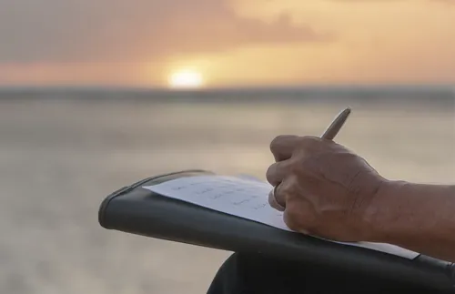 man’s hand writing